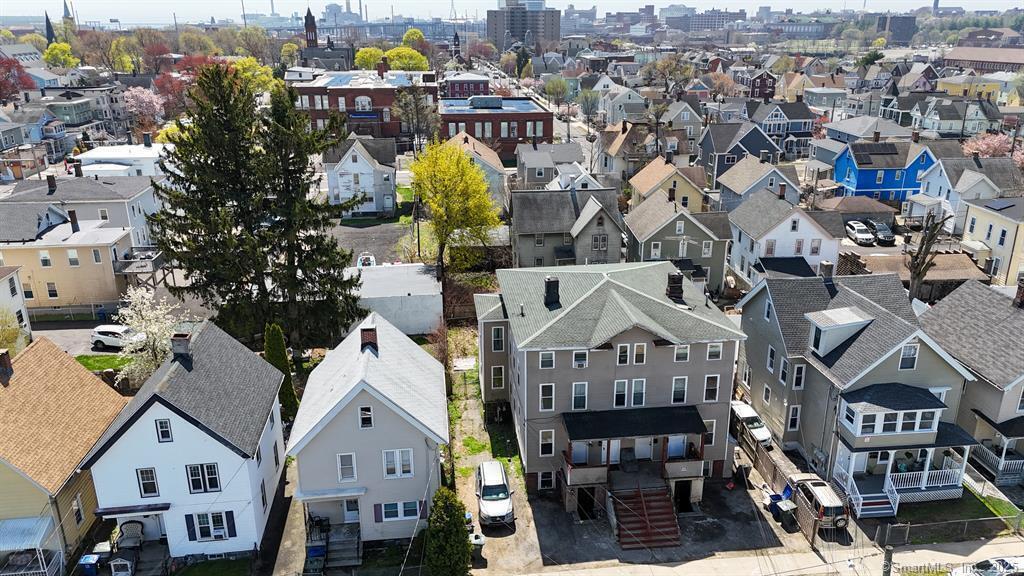 40 Jane Street Bridgeport, CT 06608 - Photo 19 of 29 an aerial view of a residential apartment building with a outdoor space and seating area