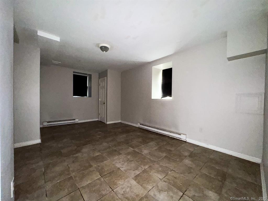 40 Jane Street Bridgeport, CT 06608 - Photo 22 of 29 an empty room with a empty space and a window