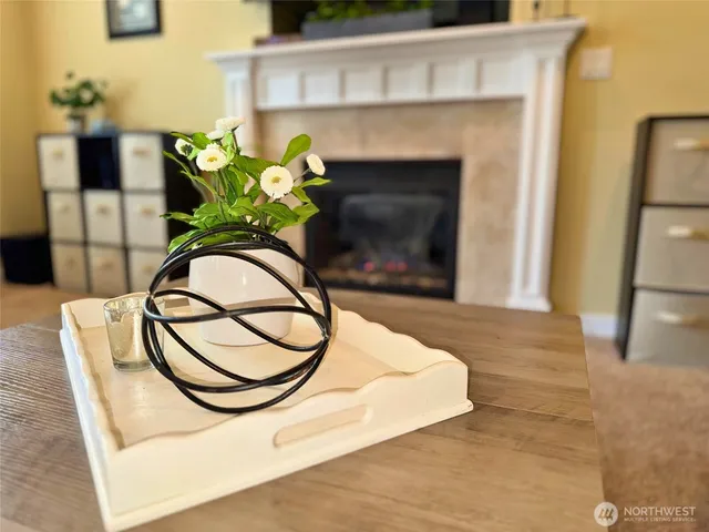 a vase of flowers sitting on a table