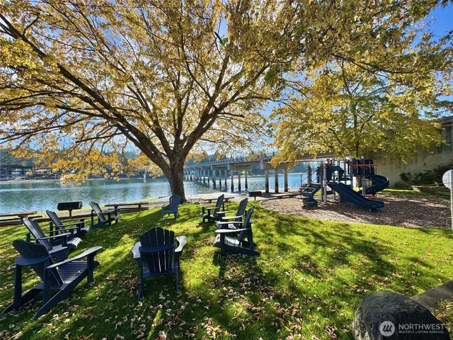 a view of a lake with a car parked