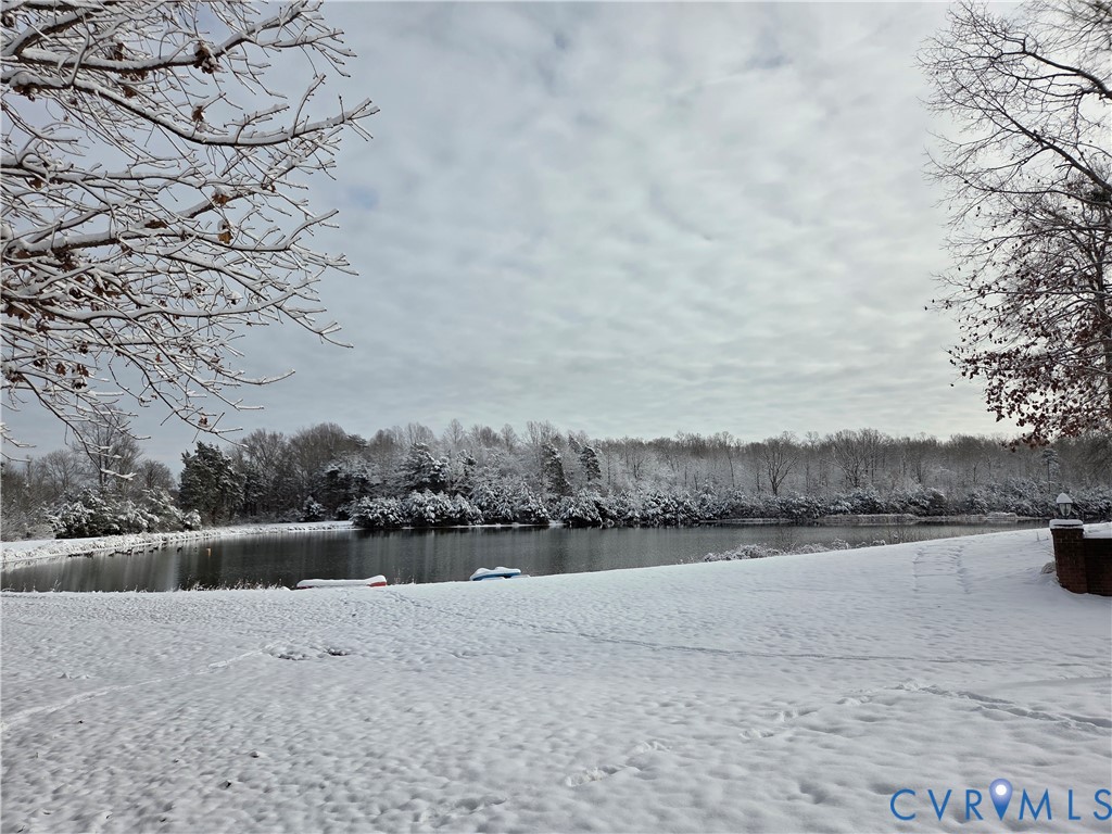 239 Jennings Road Cartersville, VA 23027 - Photo 22 of 26 Snow-covered grounds featuring a large body of wat