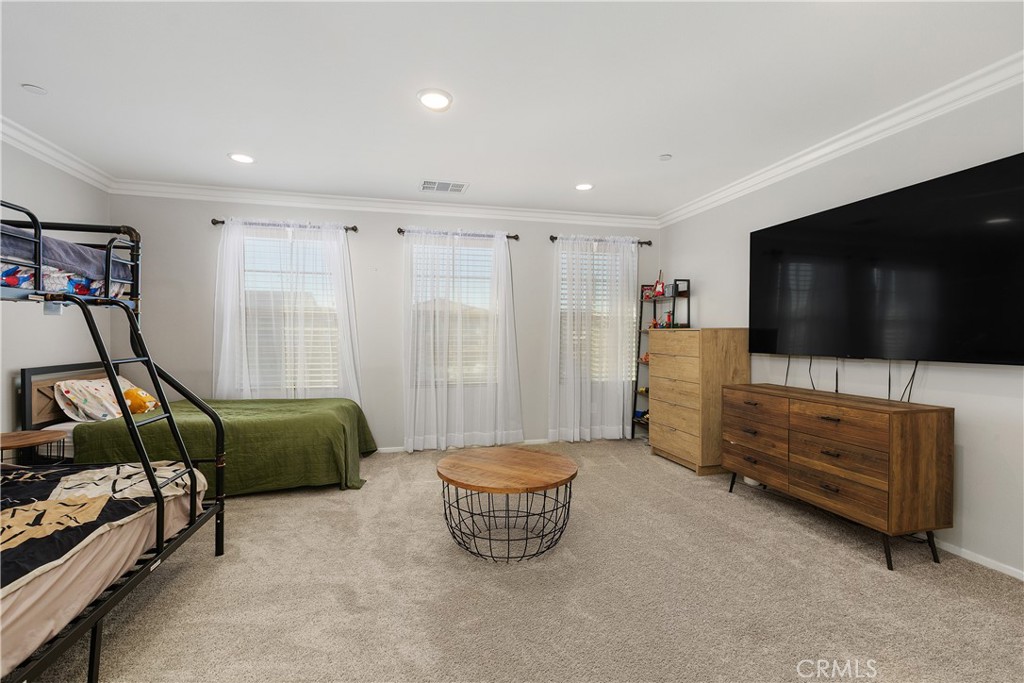 3056 Eveningcloud Street Hemet, CA 92543 - Photo 16 of 48 a living room with furniture and a flat screen tv