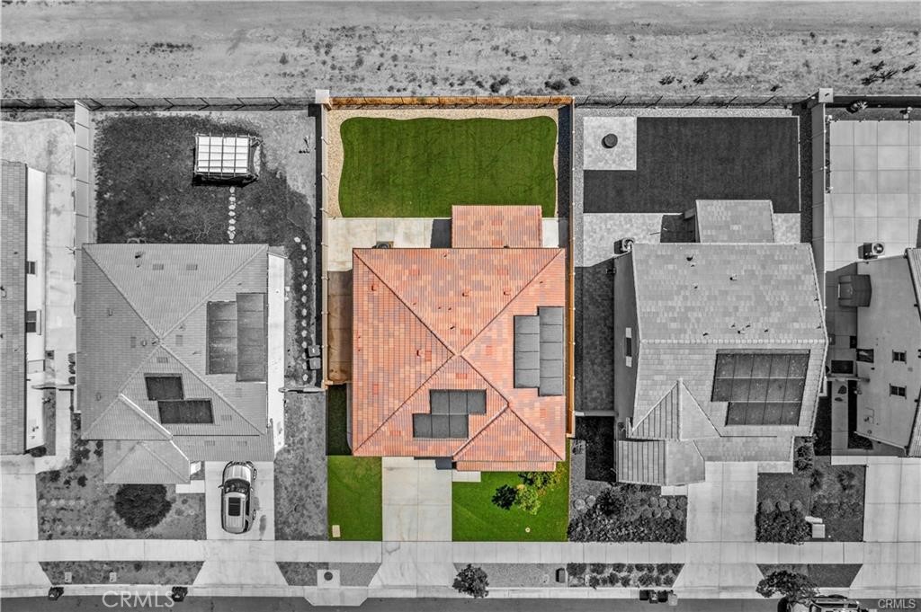 3056 Eveningcloud Street Hemet, CA 92543 - Photo 31 of 48 an aerial view of a house with a backyard space