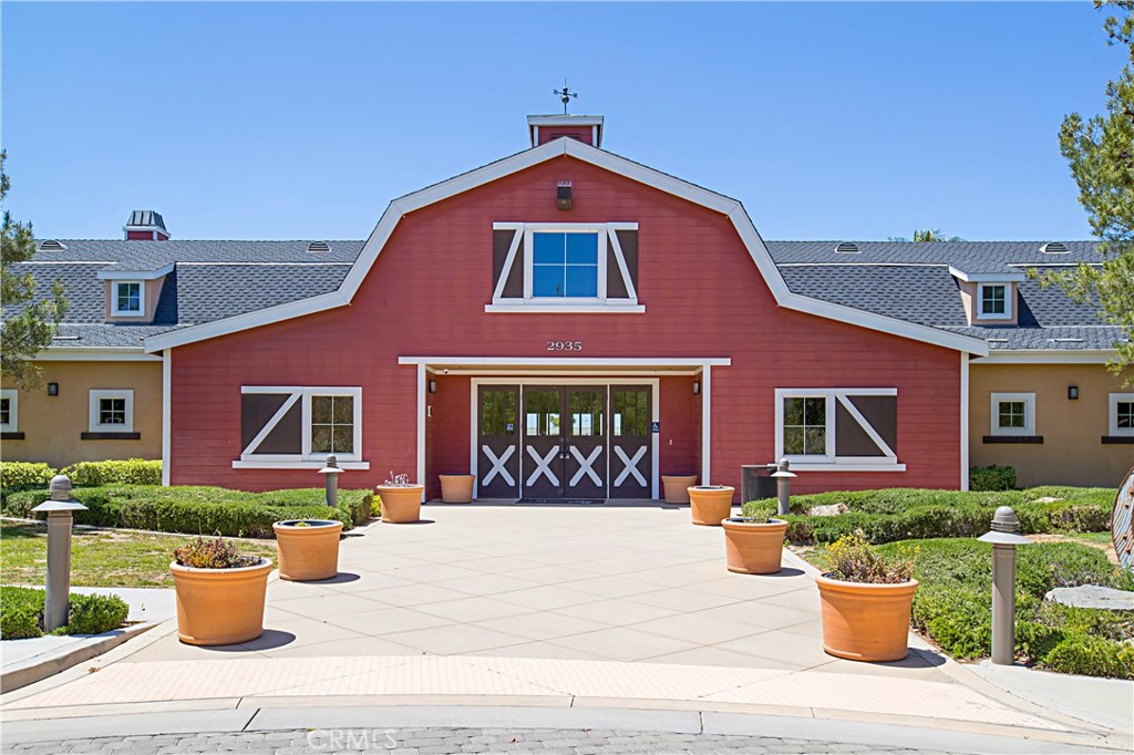 3056 Eveningcloud Street Hemet, CA 92543 - Photo 35 of 48 a front view of a house with a garden