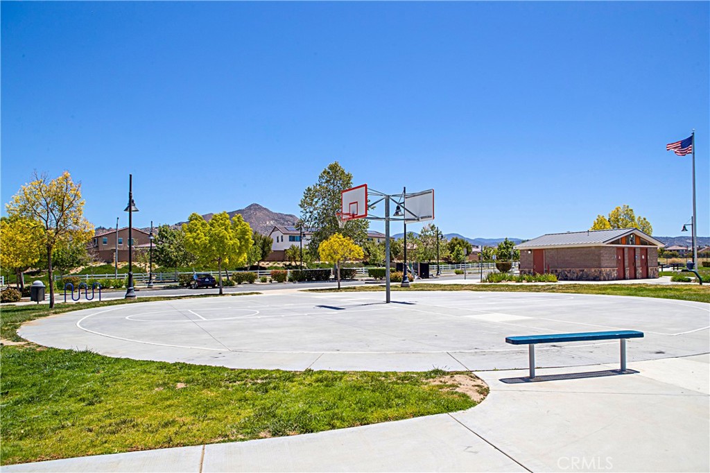 3056 Eveningcloud Street Hemet, CA 92543 - Photo 42 of 48 a view of a terrace with a table and chairs