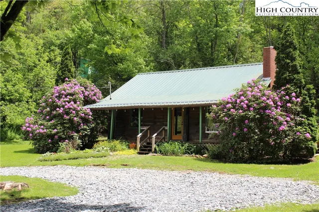 a front view of house with garden