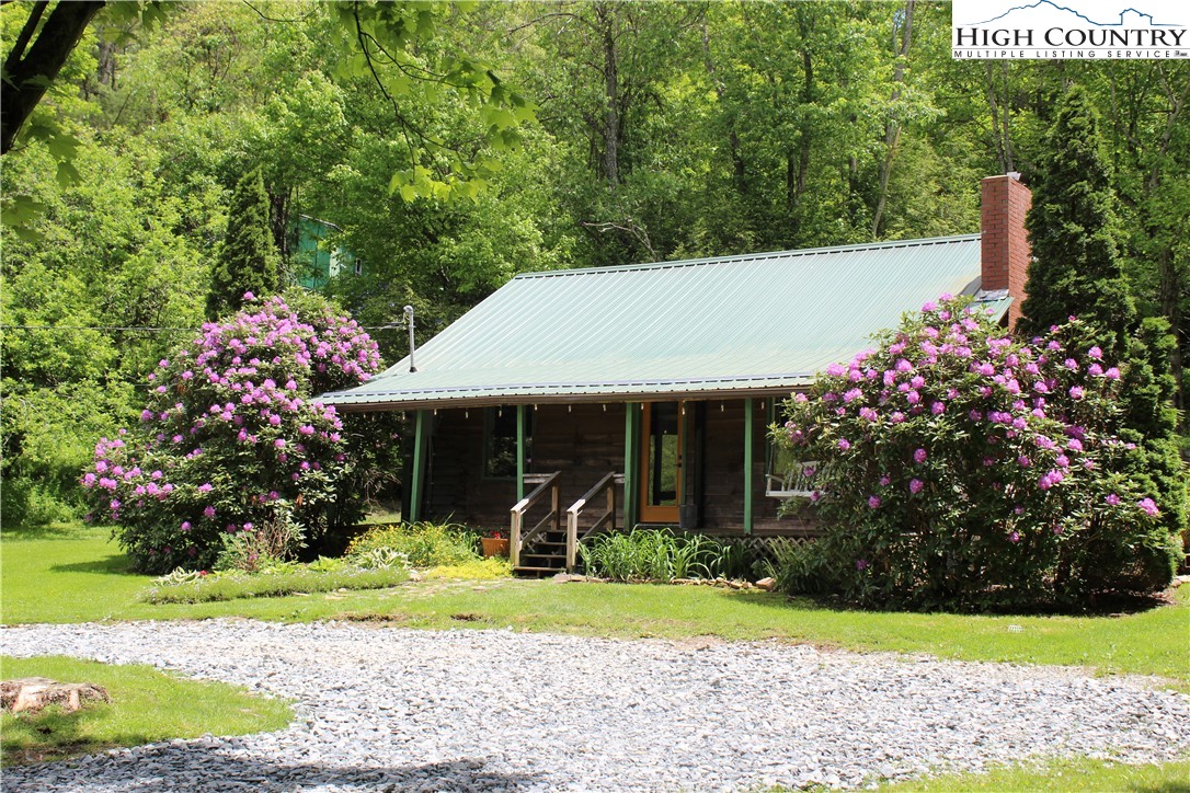 a front view of house with garden