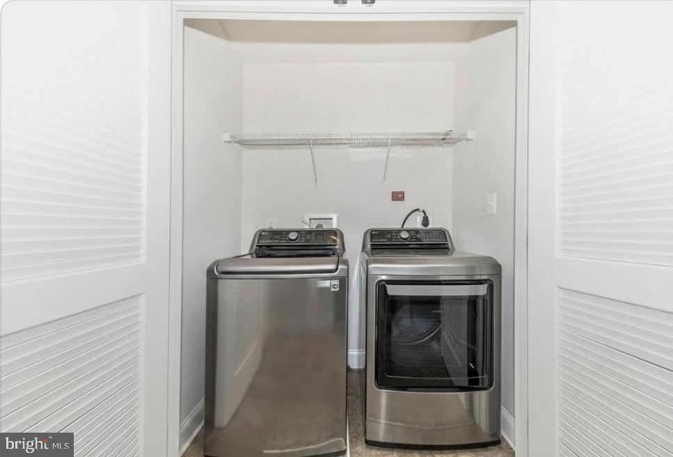 2325 Asberry Road Hanover, MD 21076 - Photo 35 of 65 a kitchen with a stove and a microwave