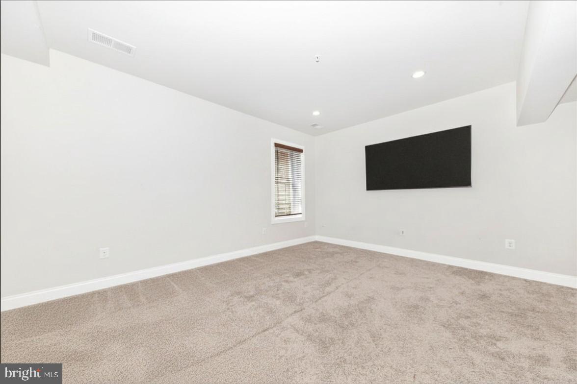 2325 Asberry Road Hanover, MD 21076 - Photo 40 of 65 a view of an empty room with a flat screen tv
