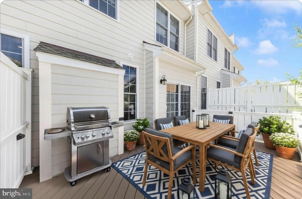 2325 Asberry Road Hanover, MD 21076 - Photo 45 of 65 a view of a dinning table and chairs in the patio