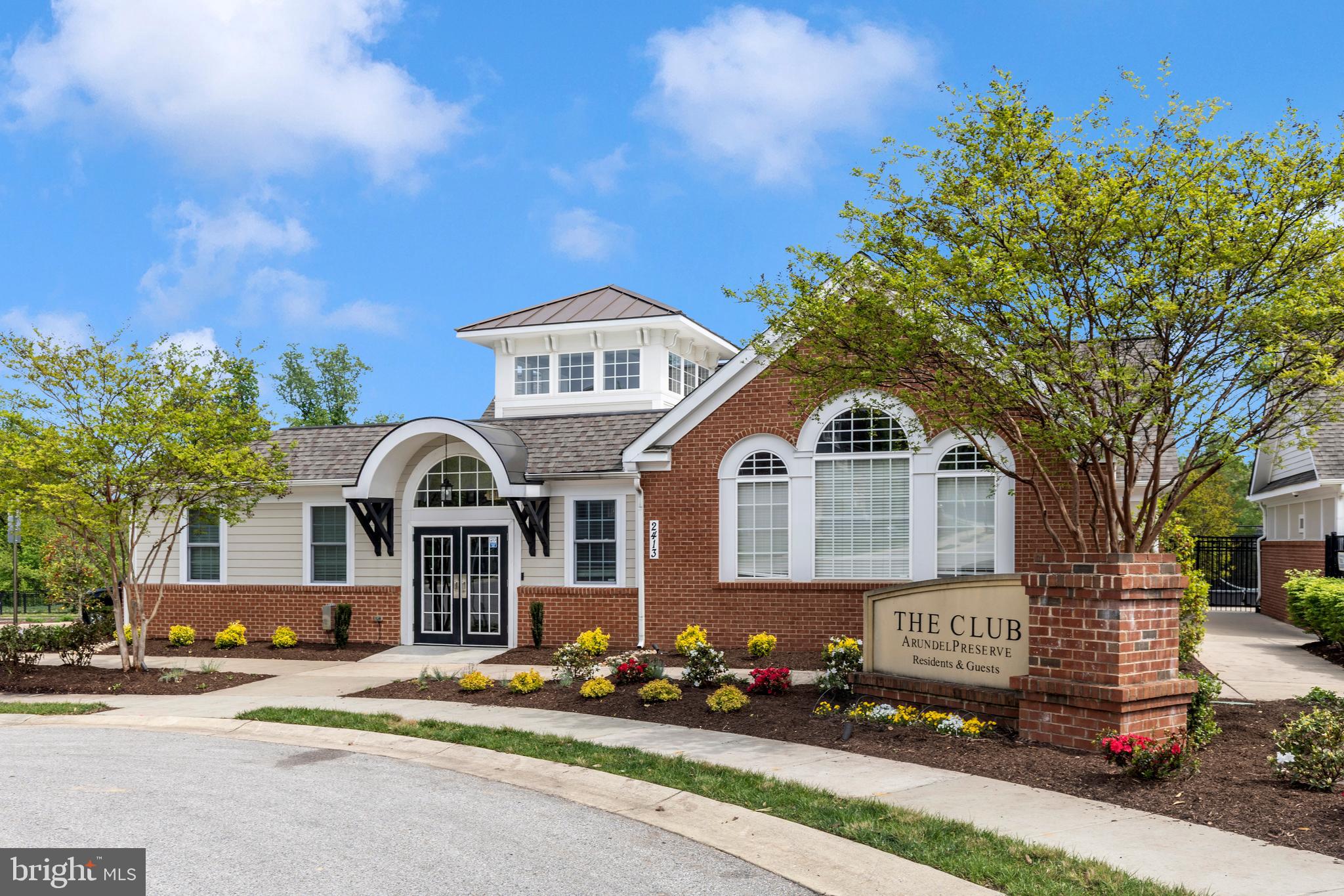 2325 Asberry Road Hanover, MD 21076 - Photo 54 of 65 a front view of a house with a garden