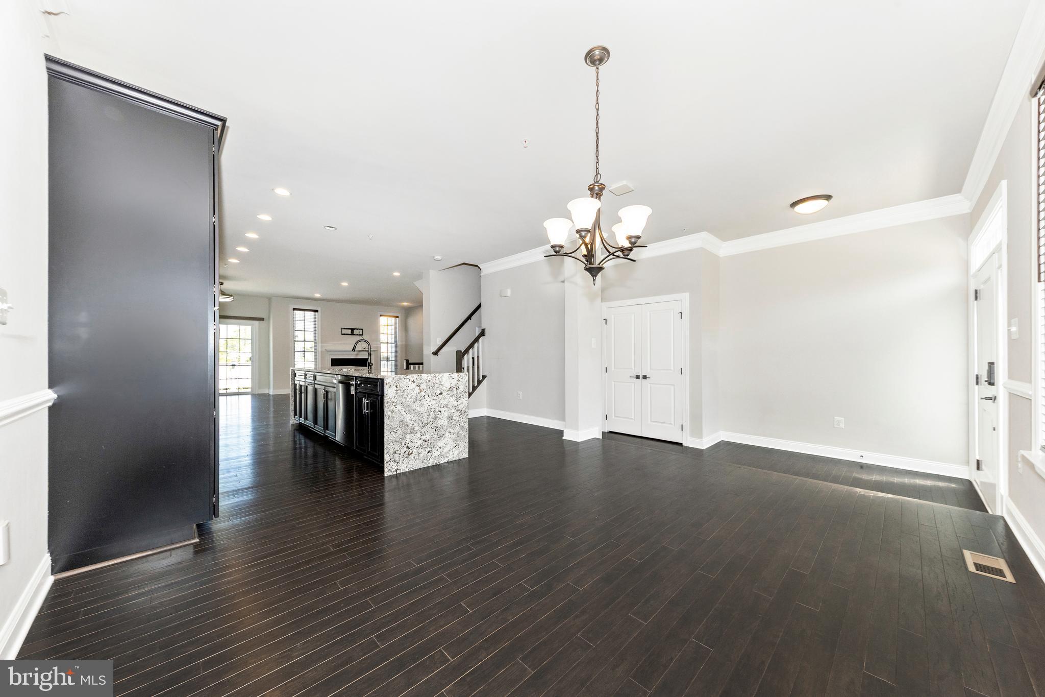 2325 Asberry Road Hanover, MD 21076 - Photo 9 of 65 a view of empty room with wooden floor