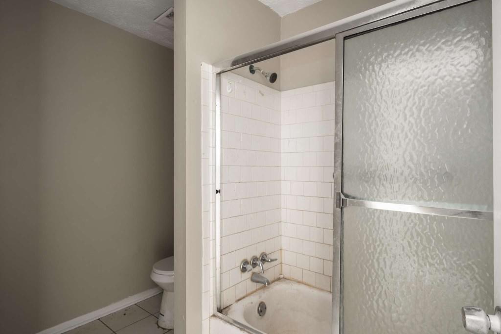 3254 Strawberry Lane Decatur, GA 30034 - Photo 17 of 27 a bathroom with a shower and a toilet