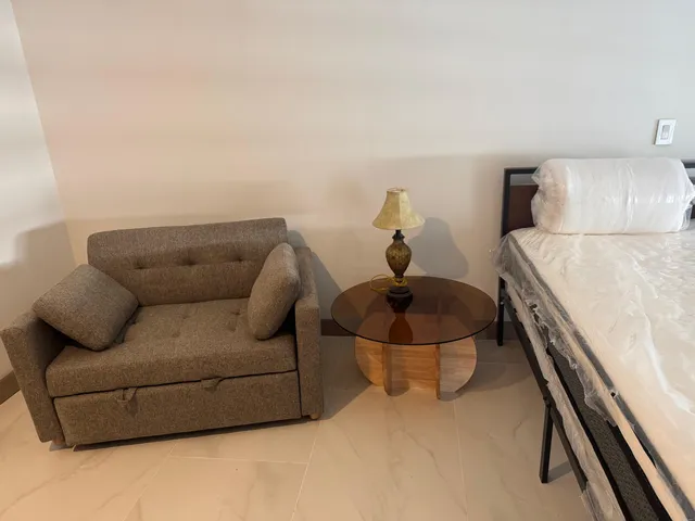 a white bath tub sitting in a bathroom