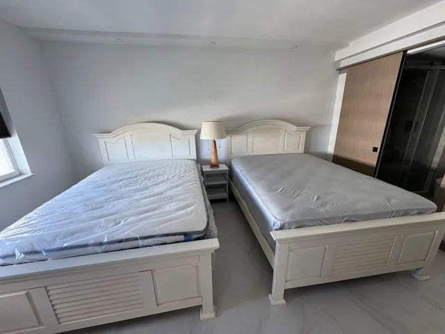 a view of a building with a black door