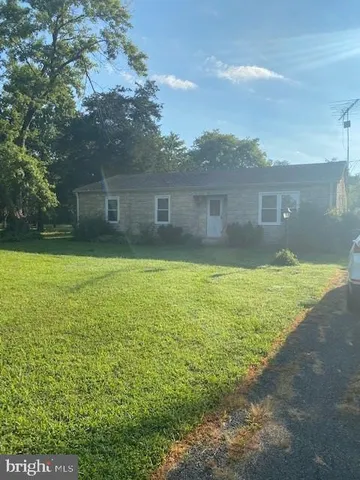 a view of a outdoor space and swimming pool
