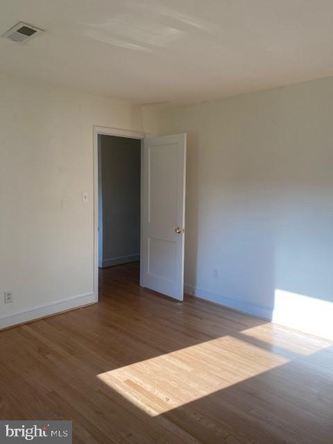 12209 Baines Corner Road Bealeton, VA 22712 - Photo 14 of 14 an empty room with wooden floor