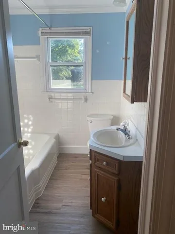 a bathroom with a sink and a bathtub
