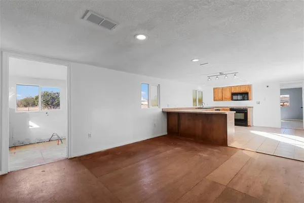 a view of a kitchen with a sink