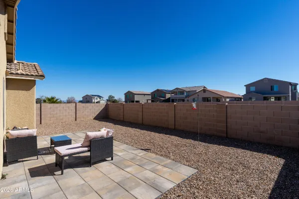 a backyard of a house with seating space