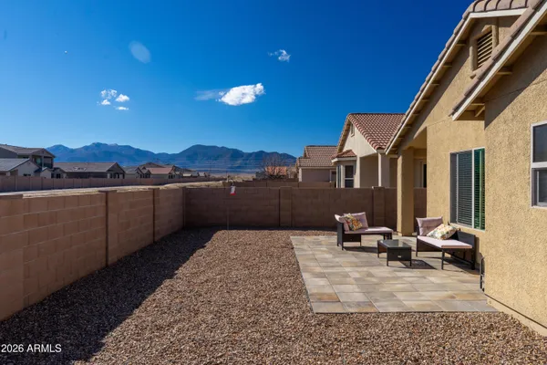 a view of a terrace with furniture