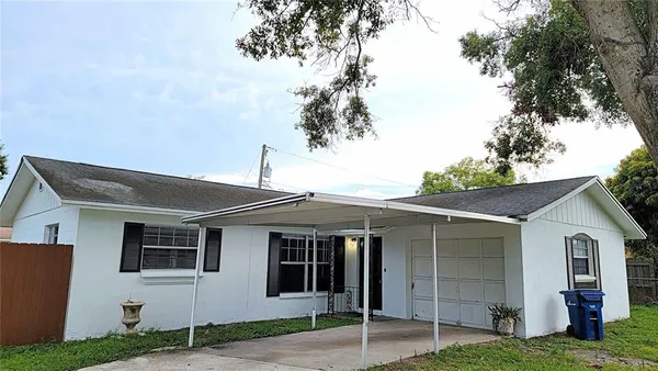 a front view of a house with a garage