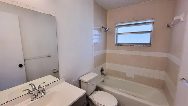 a bathroom with a sink and a bathtub