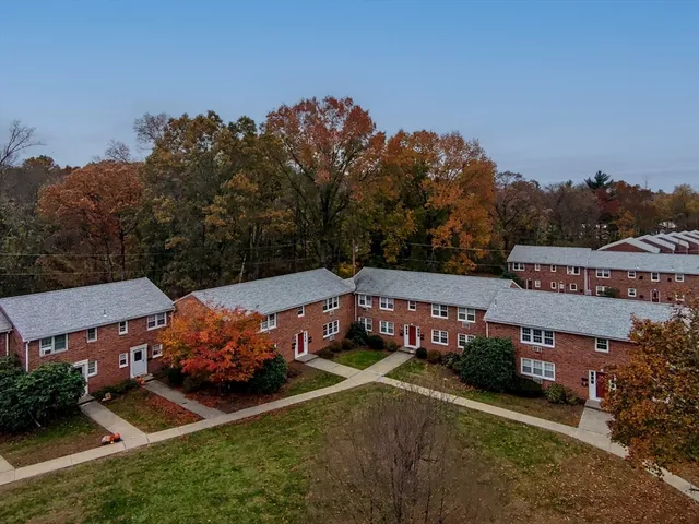an aerial view of a house with a garden