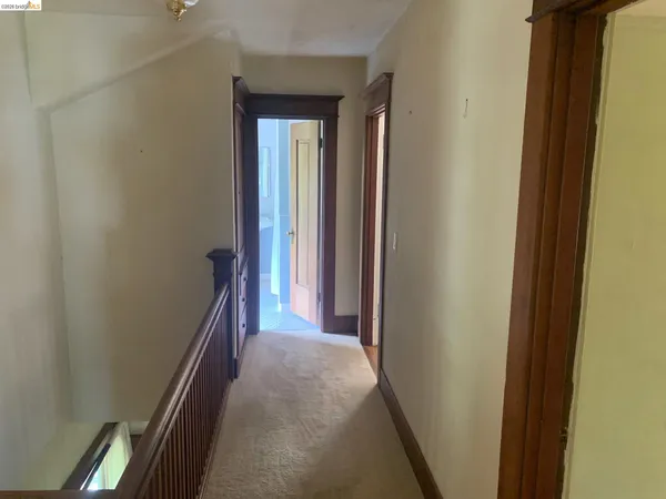 a view of a hallway with a glass door