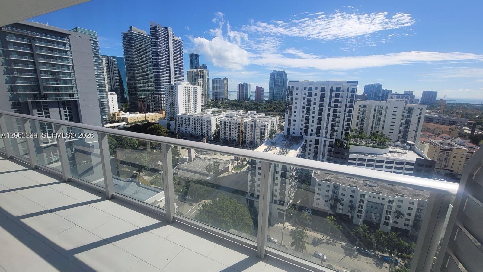 a view of buildings from a balcony