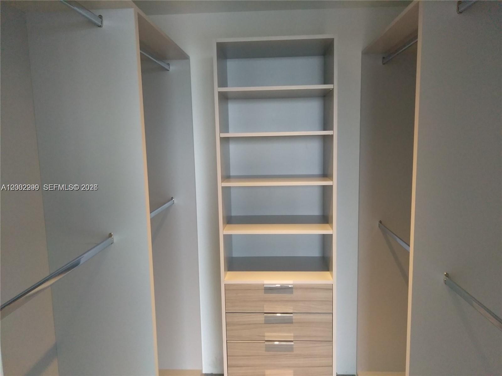 1010 Southwest 2nd Avenue, Unit 1901 Miami, FL 33130 - Photo 4 of 8 a view of an empty walk in closet