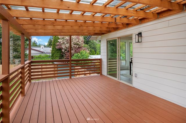 a view of outdoor space with wooden floor and outdoor space