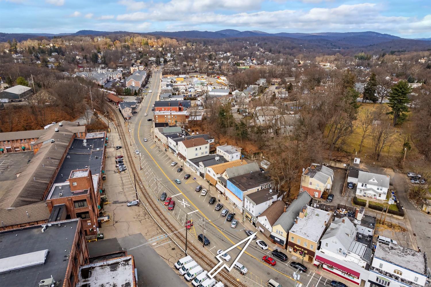 144 Main Street Butler, NJ 07405 - Photo 3 of 24 an aerial view of a city