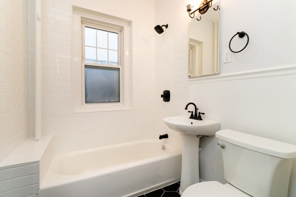 12 Pond Street, Unit 3 Boston, MA 02130 - Photo 18 of 39 a bathroom with a sink mirror toilet and bathtub