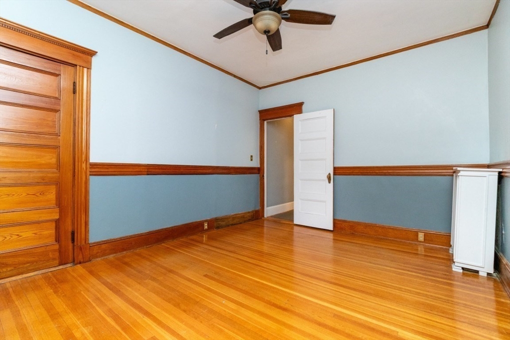 12 Pond Street, Unit 3 Boston, MA 02130 - Photo 19 of 39 a view of an empty room with wooden floor