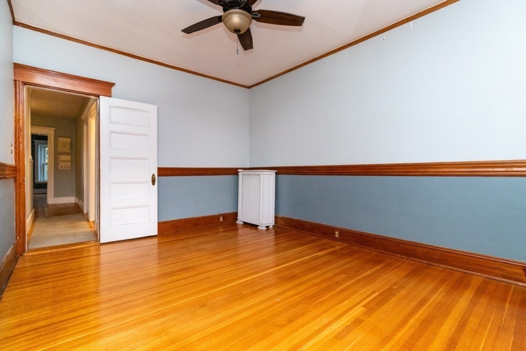 12 Pond Street, Unit 3 Boston, MA 02130 - Photo 20 of 39 a view of an empty room with wooden floor