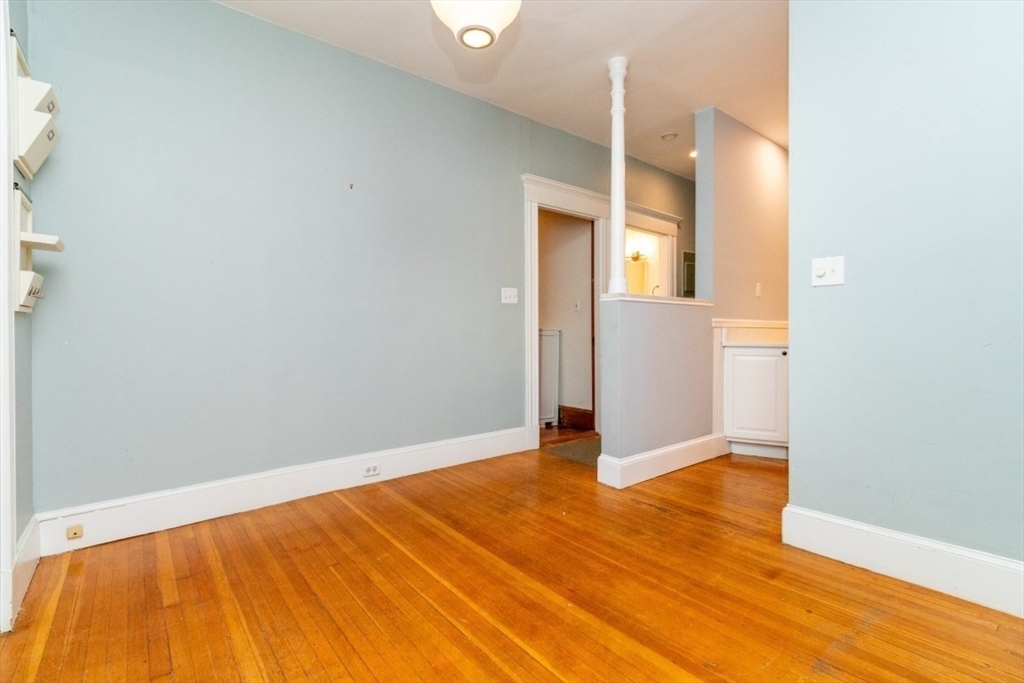 12 Pond Street, Unit 3 Boston, MA 02130 - Photo 6 of 39 a view of an empty room with wooden floor