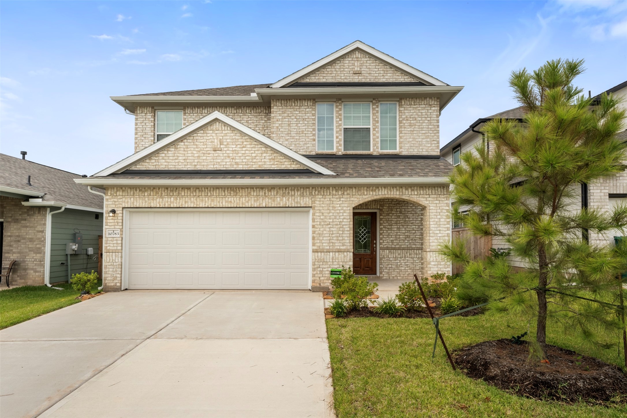 10783 Sora Drive Willis, TX 77378 - Photo 1 of 26 a front view of a house with garden