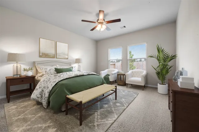 a bed room with a bed and a couch