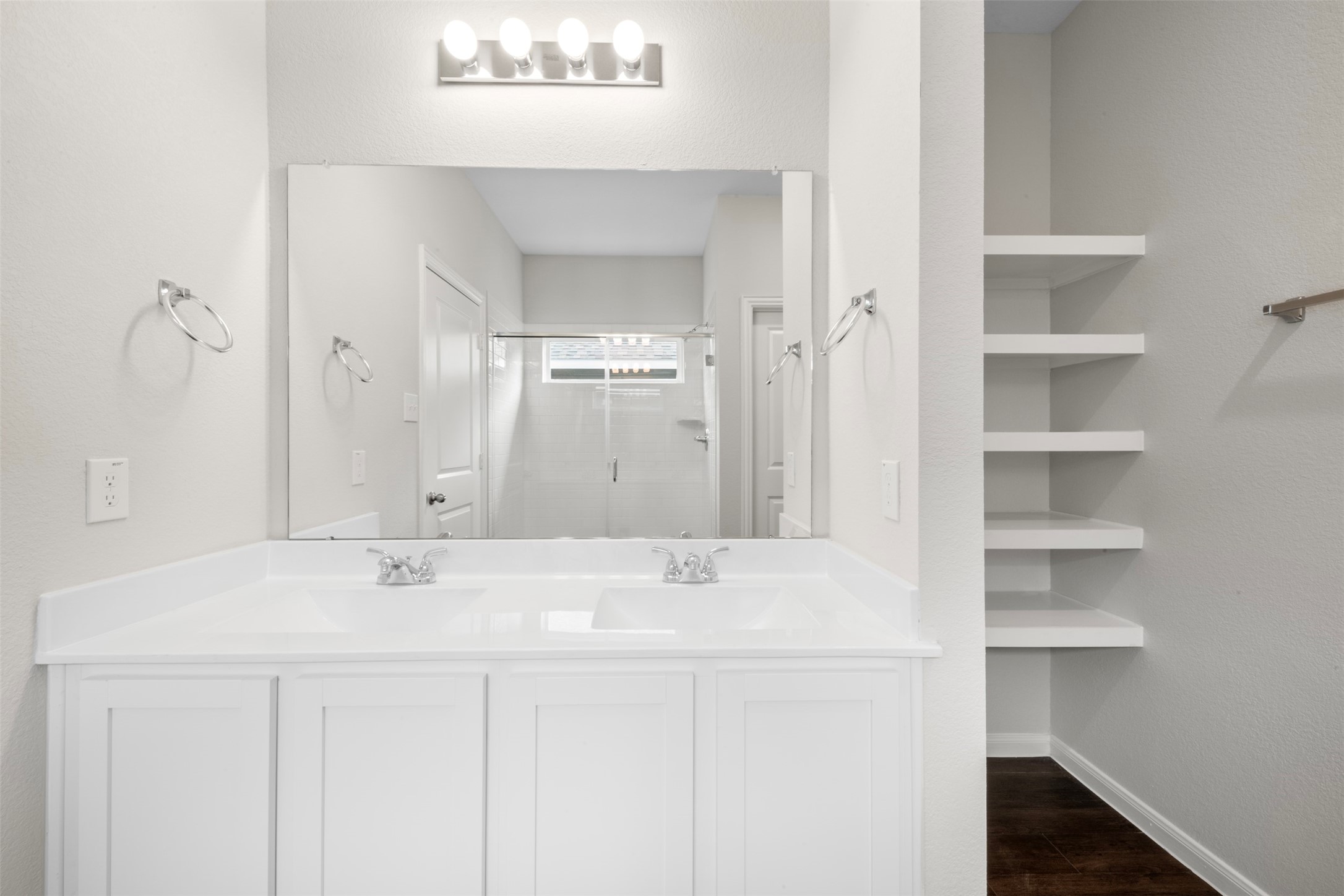 10783 Sora Drive Willis, TX 77378 - Photo 12 of 26 a bathroom with a sink and a mirror