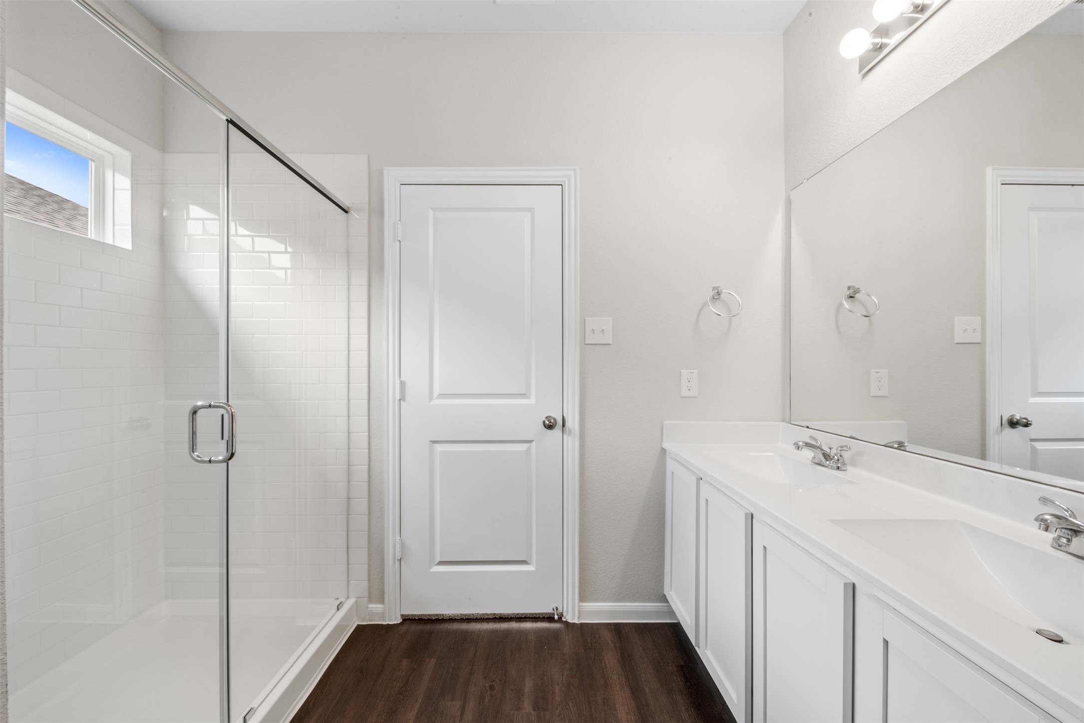 10783 Sora Drive Willis, TX 77378 - Photo 13 of 26 a bathroom with a sink and a mirror