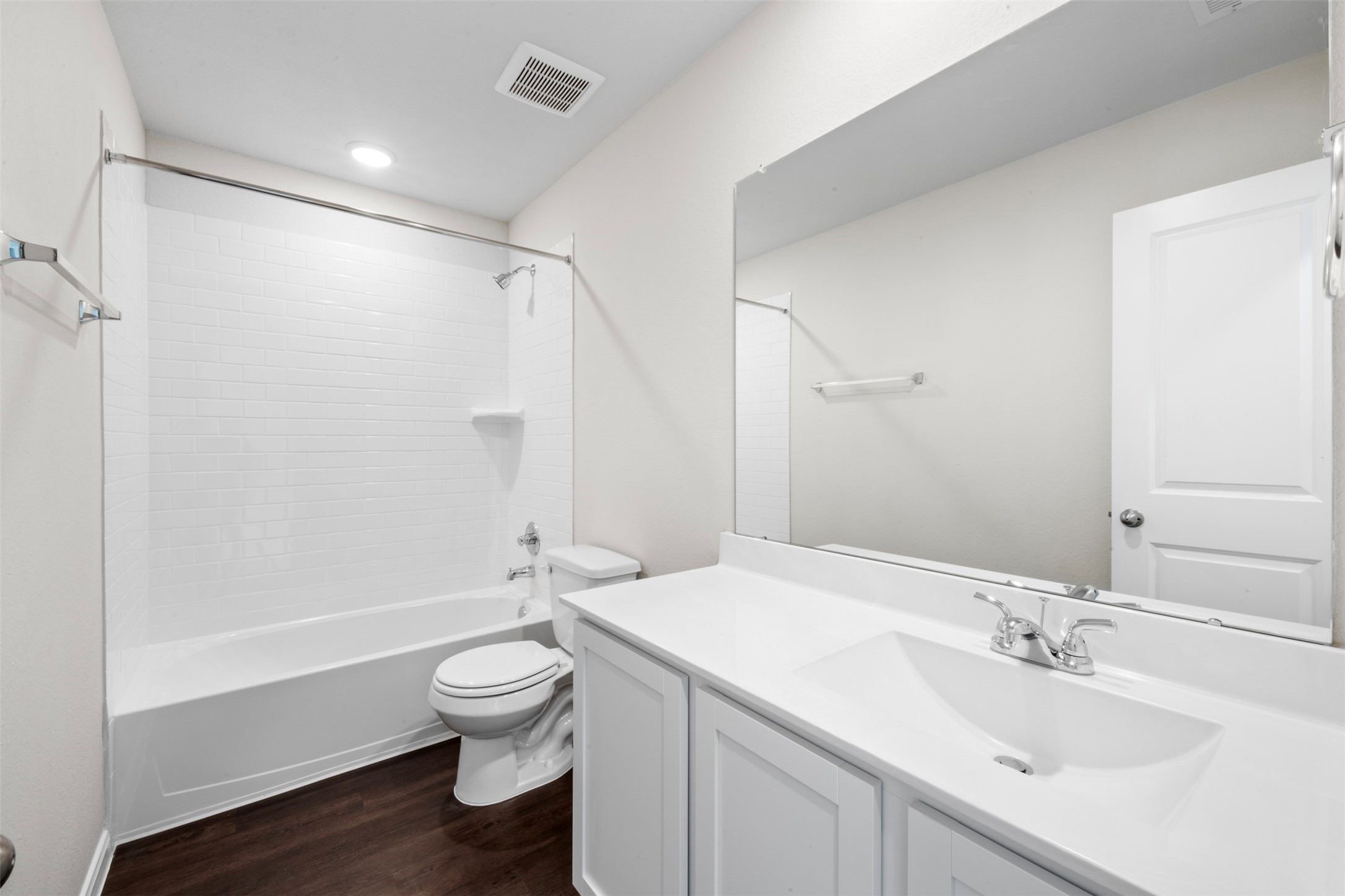 10783 Sora Drive Willis, TX 77378 - Photo 20 of 26 a bathroom with a sink a toilet and shower