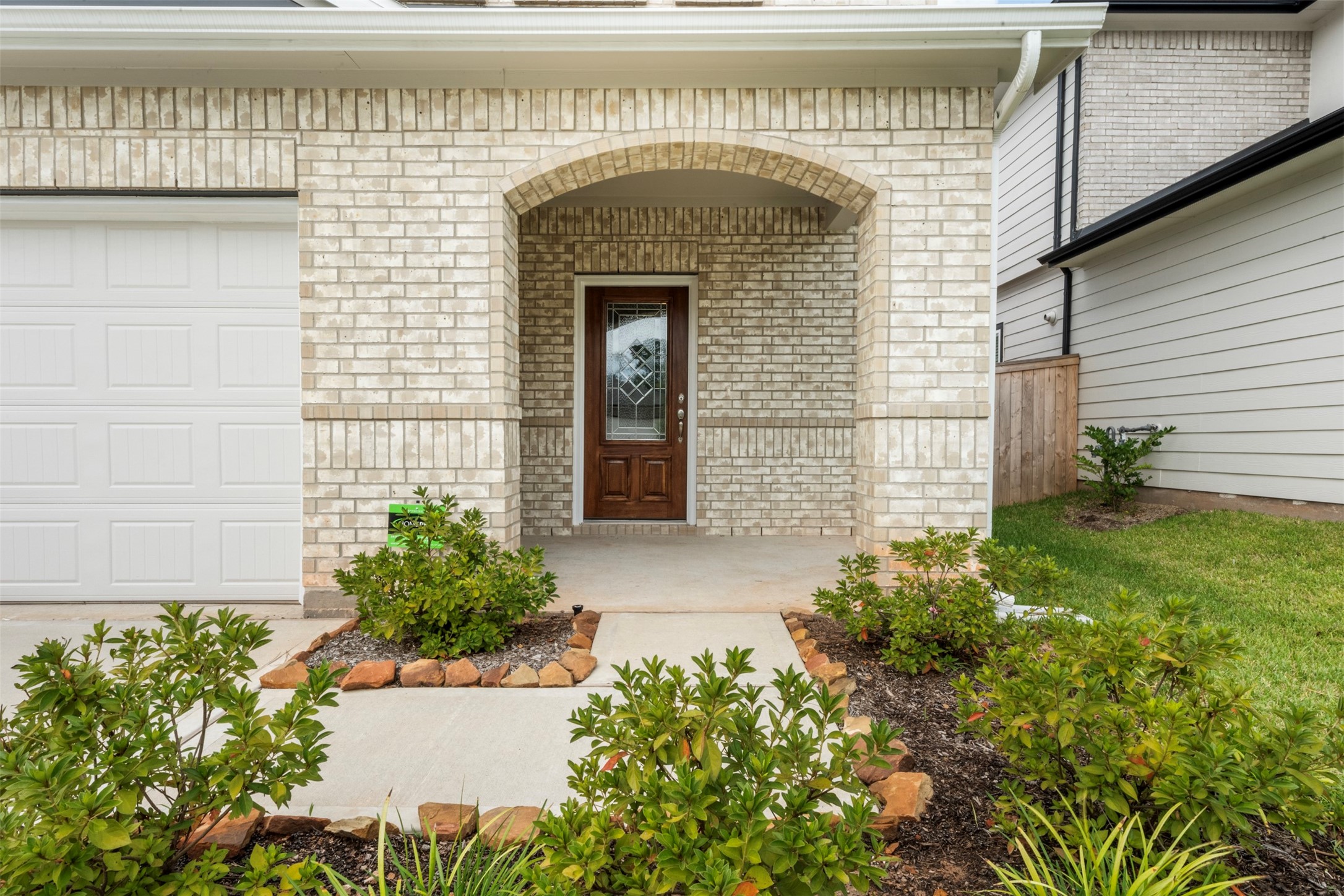 10783 Sora Drive Willis, TX 77378 - Photo 2 of 26 a front view of a house with garden