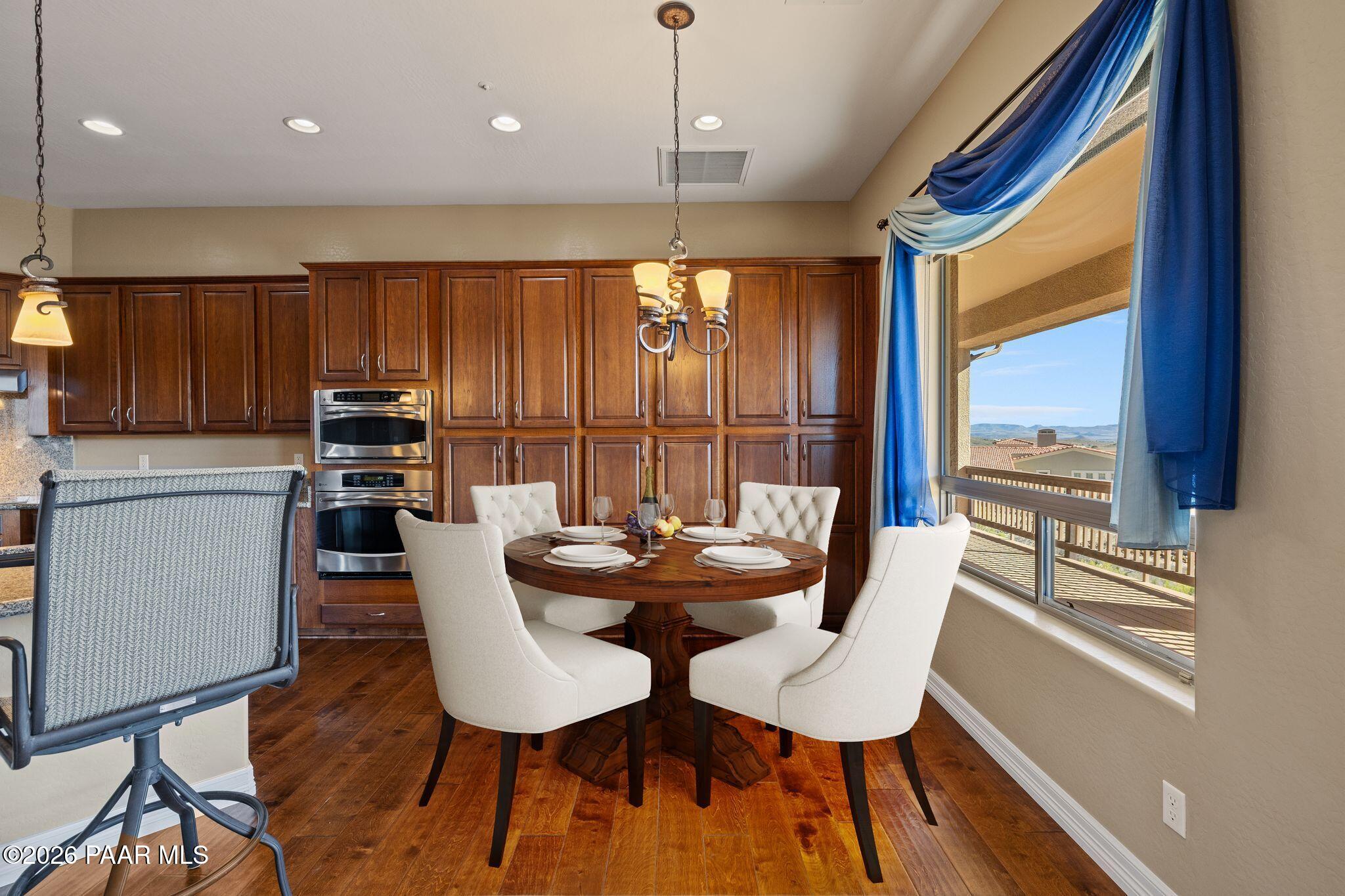 15411 East Rough Rider Ridge Mayer, AZ 86333 - Photo 17 of 57 a view of a dining room with furniture and window