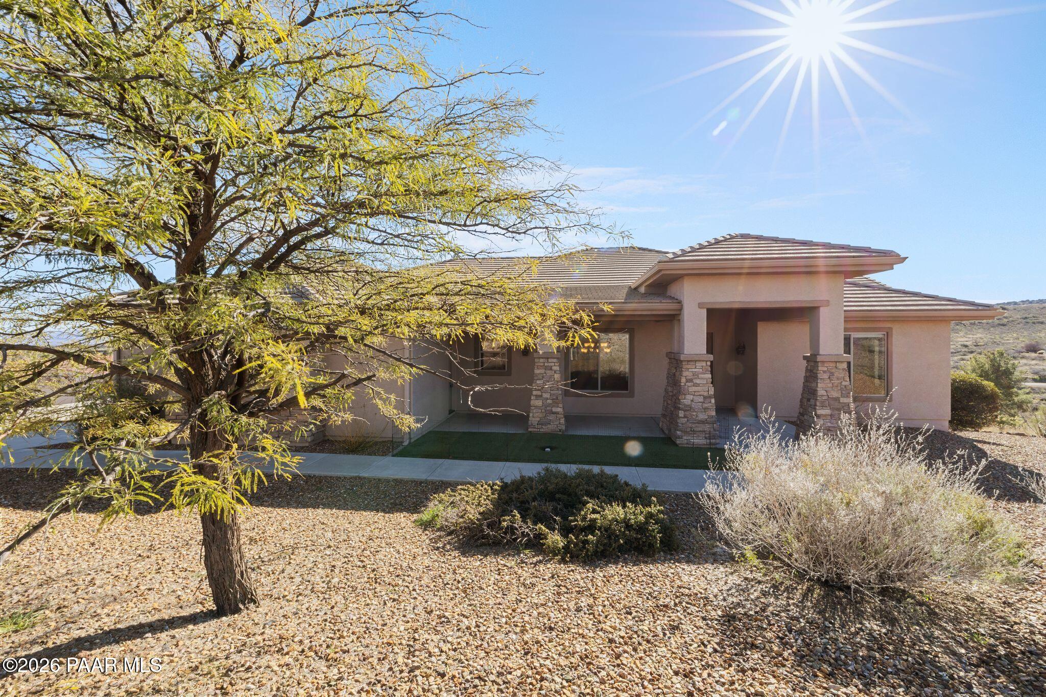 15411 East Rough Rider Ridge Mayer, AZ 86333 - Photo 2 of 57 a front view of a house with a yard