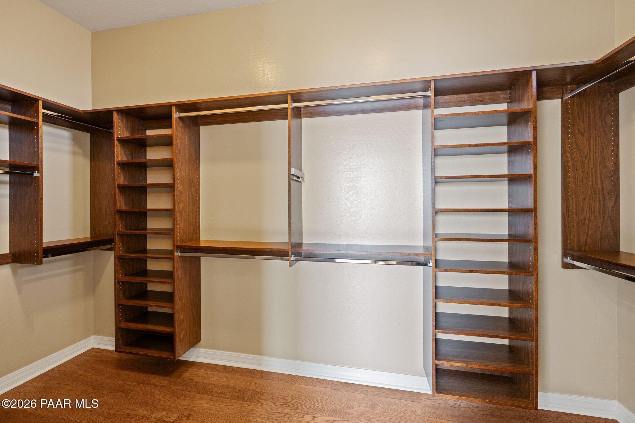 15411 East Rough Rider Ridge Mayer, AZ 86333 - Photo 28 of 57 a view of walk in closet with empty racks