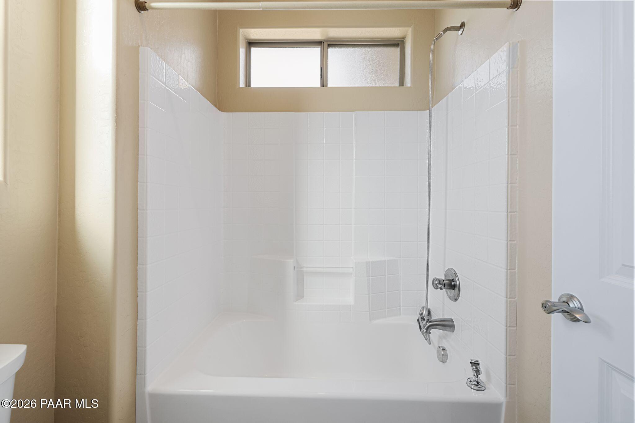 15411 East Rough Rider Ridge Mayer, AZ 86333 - Photo 35 of 57 a bathroom with a bathtub