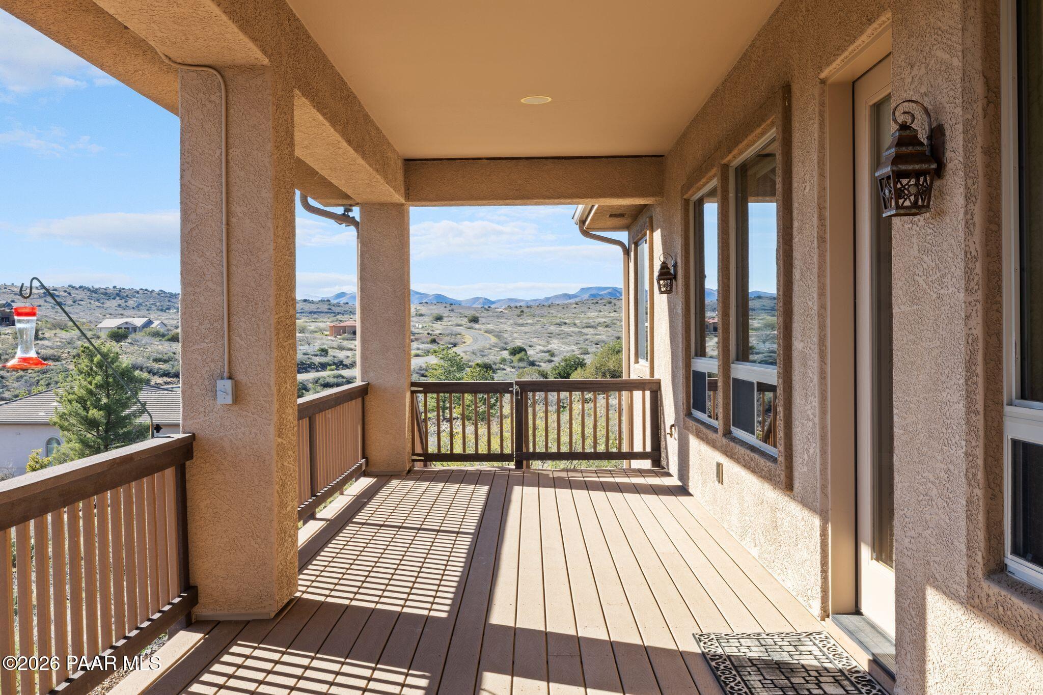 15411 East Rough Rider Ridge Mayer, AZ 86333 - Photo 46 of 57 a view of a balcony with wooden floor