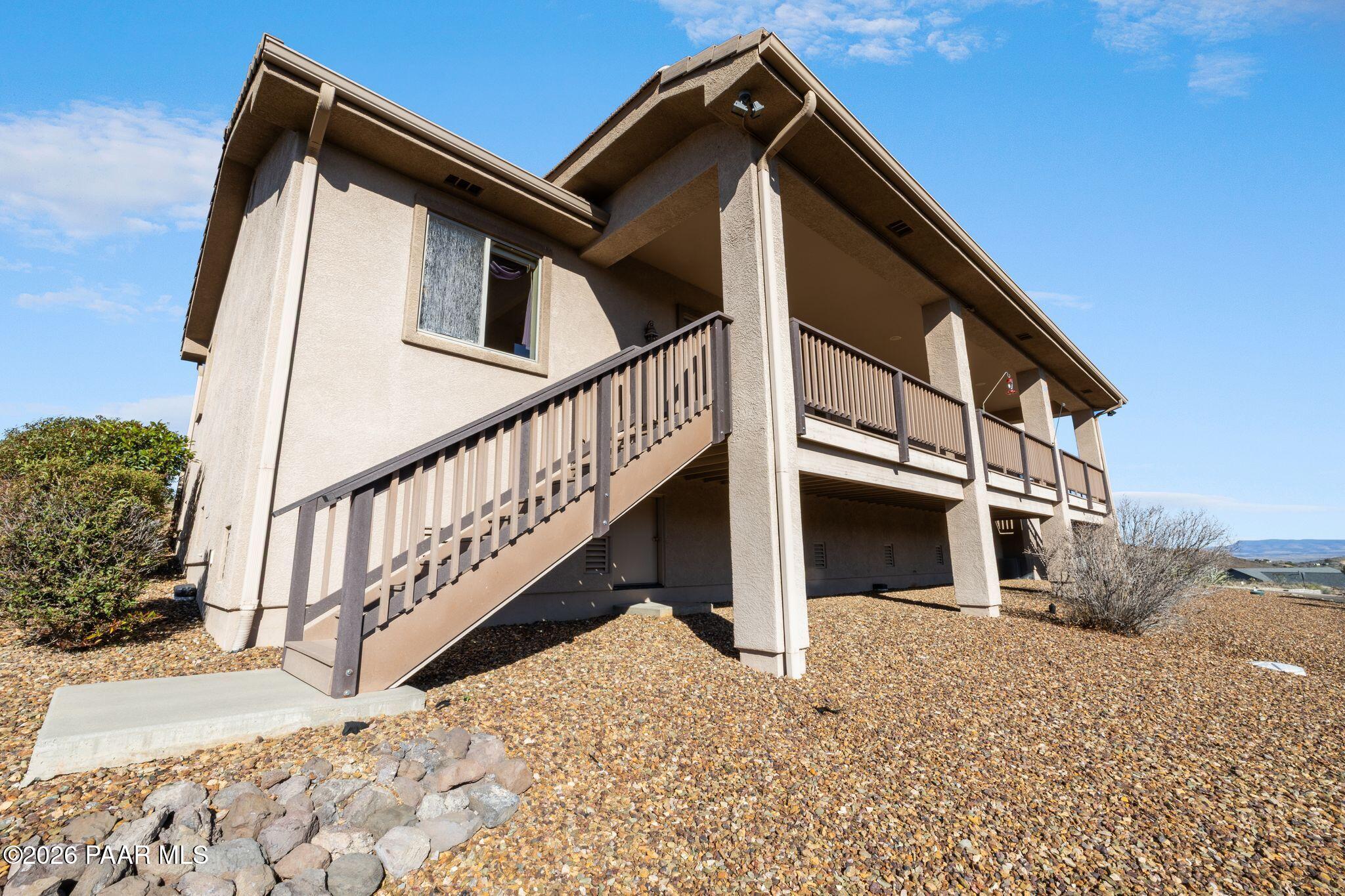 15411 East Rough Rider Ridge Mayer, AZ 86333 - Photo 49 of 57 a view of house with staircase and wooden floor