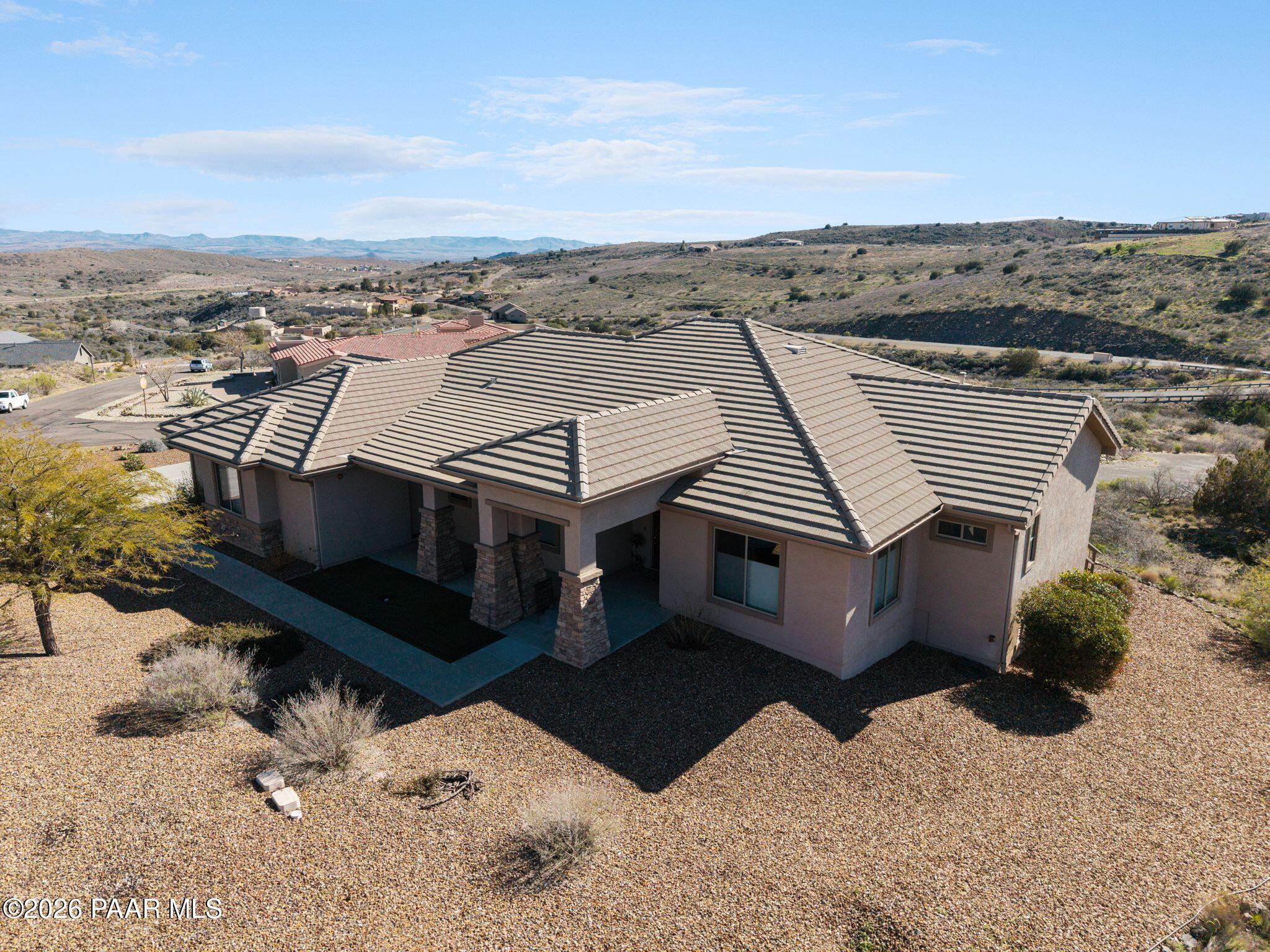15411 East Rough Rider Ridge Mayer, AZ 86333 - Photo 52 of 57 a view of a roof with sitting area